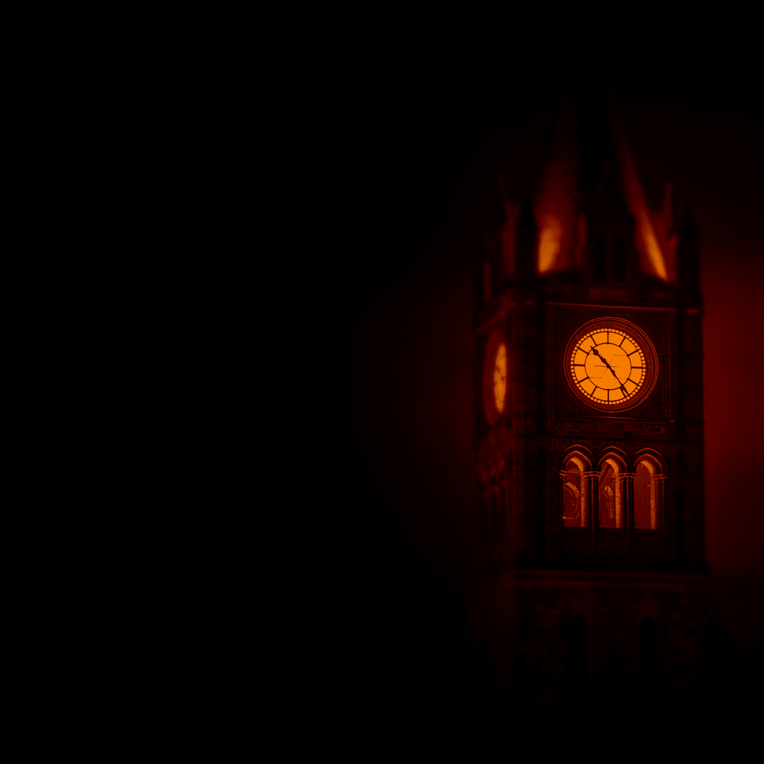 A tall clock tower with illuminated clock faces is set against a dark background, casting a warm, reddish glow.